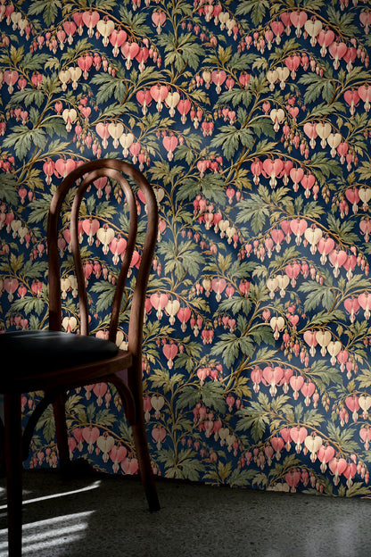 Overhead look at wallpaper sample sheet with dicentra motif and ruler