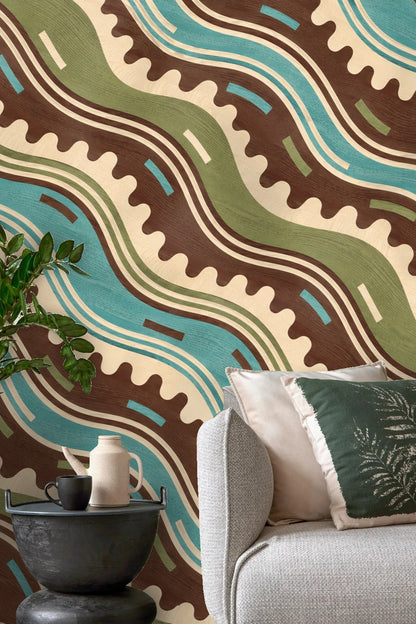 Room corner with Crenellation Current wallpaper paired with neutral textiles and plants