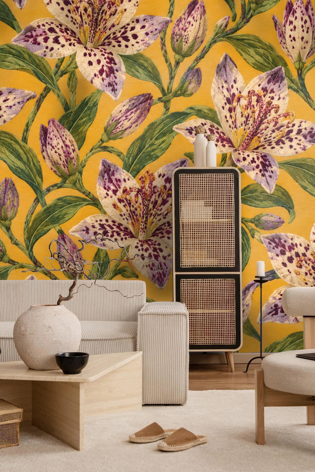 Side view of leather chair positioned against bright floral wallpaper with detailed wild lilies