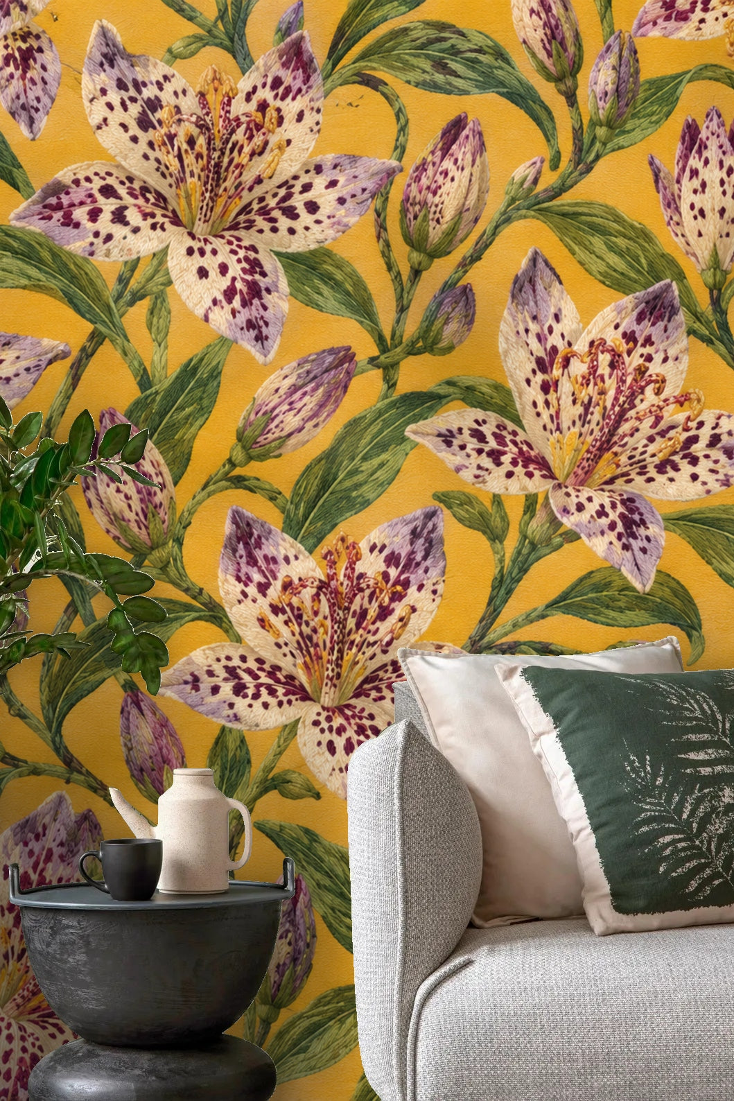 Room detail highlighting the wallpaper's painterly texture and botanical motif in a cozy living space