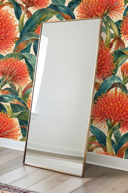 Partial view of wallpaper showing intertwining leaves and floral stems in painterly style.