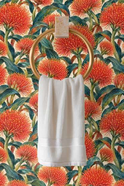 Wall with dense scadoxus blossoms in rich red and green hues creating dramatic botanical effect.