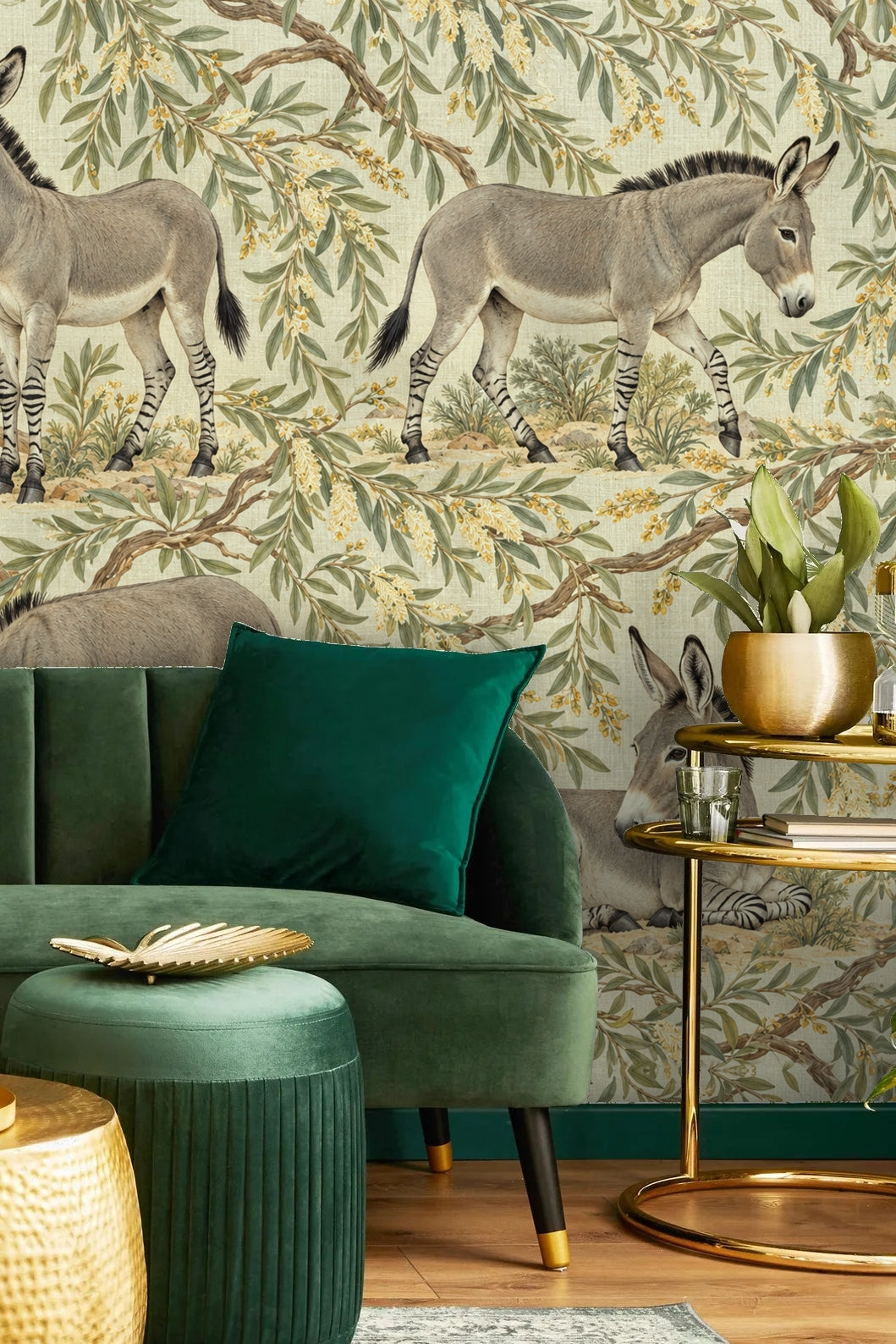 Close-up of Wild Ass Desert Willow wallpaper behind a green velvet scalloped bedhead