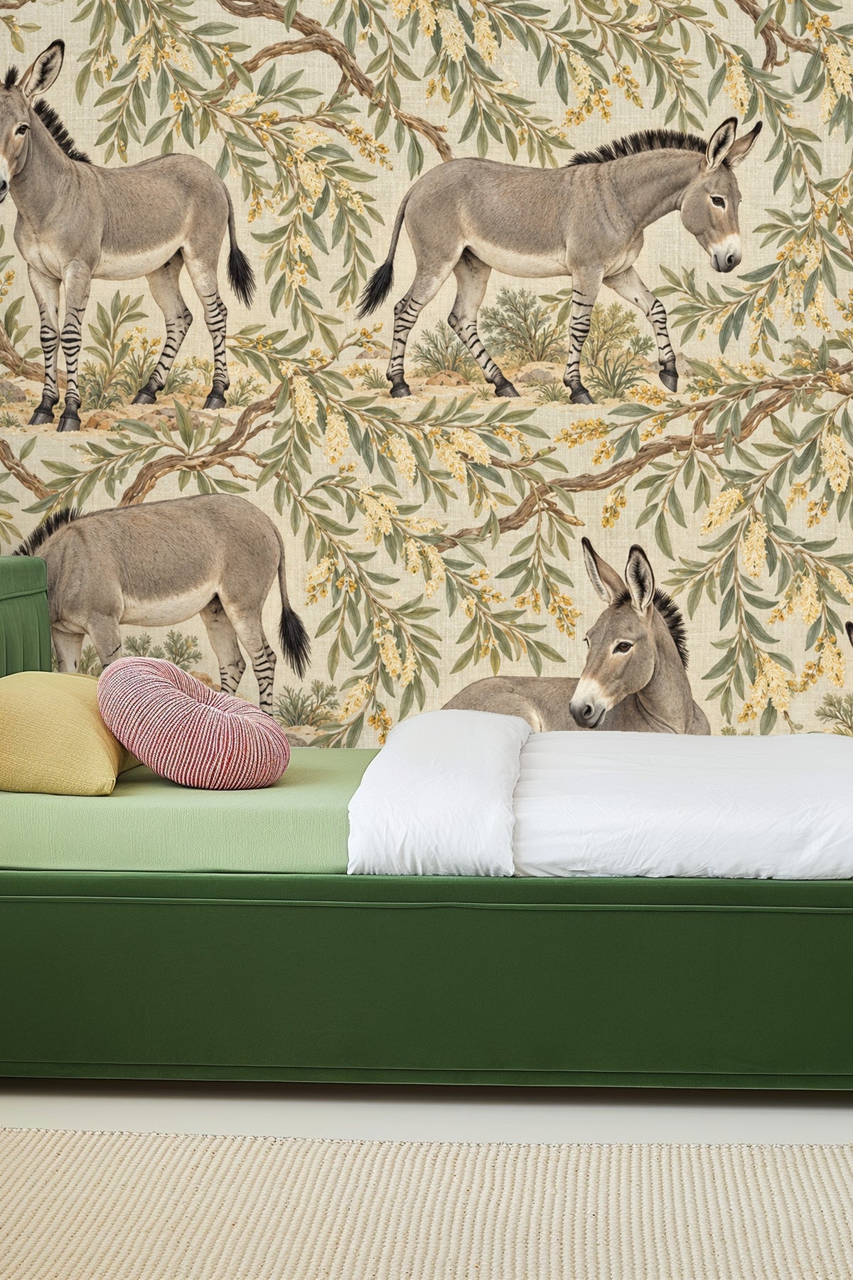 Donkey lying down among desert willow branches in wallpaper