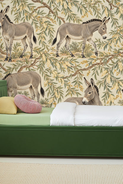 Donkey lying down among desert willow branches in wallpaper