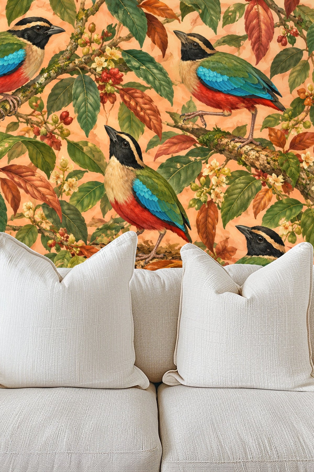 Vibrant tropical bird wallpaper wall in living room with mustard sofa and orange pillows.