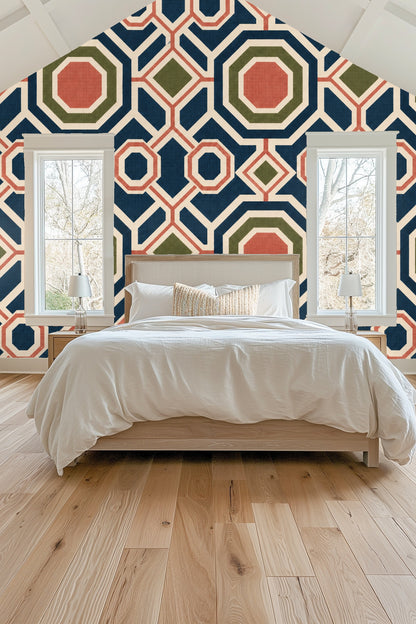 Close-up texture shot of wallpaper fabric showing subtle linen-like weave in navy, coral, and olive geometric forms.