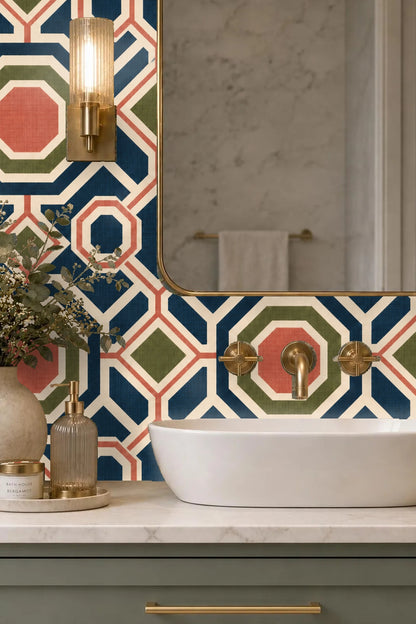 Detail of wallpaper corner showing repeat of octagonal navy and coral pattern with olive diamond accents.