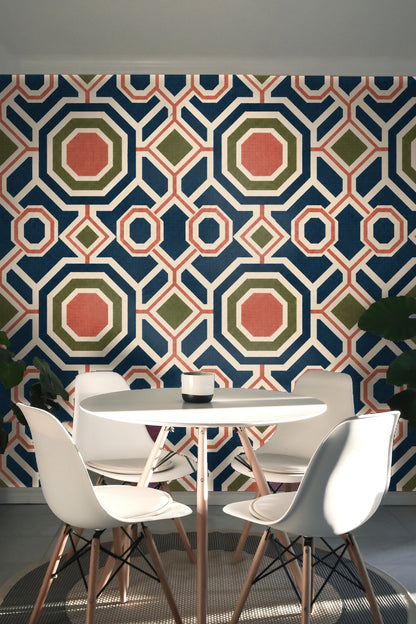 Full shot of wallpapered wall emphasizing tessellated octagon and diamond forms in muted earth tones.
