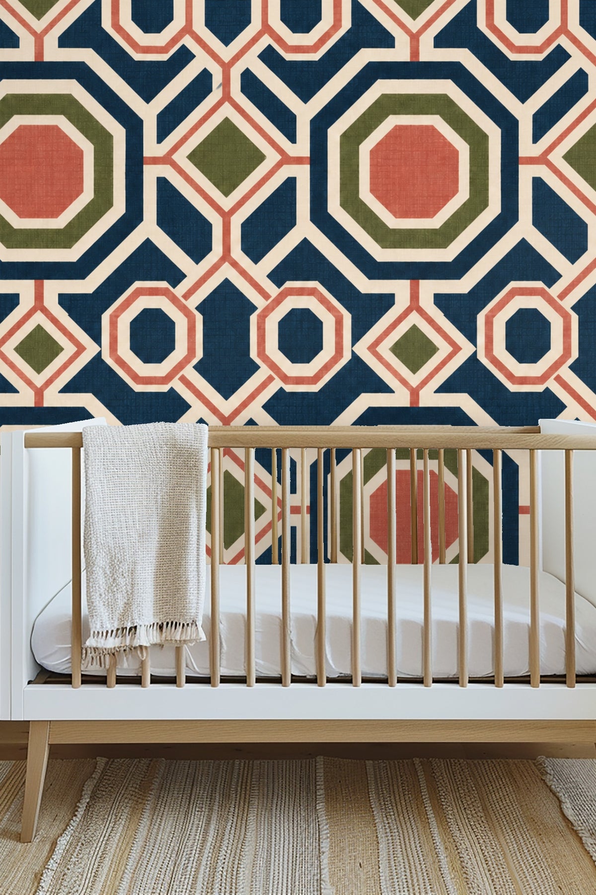 Close-up of octagonal and diamond geometric wallpaper pattern showing layered textures and color separation.