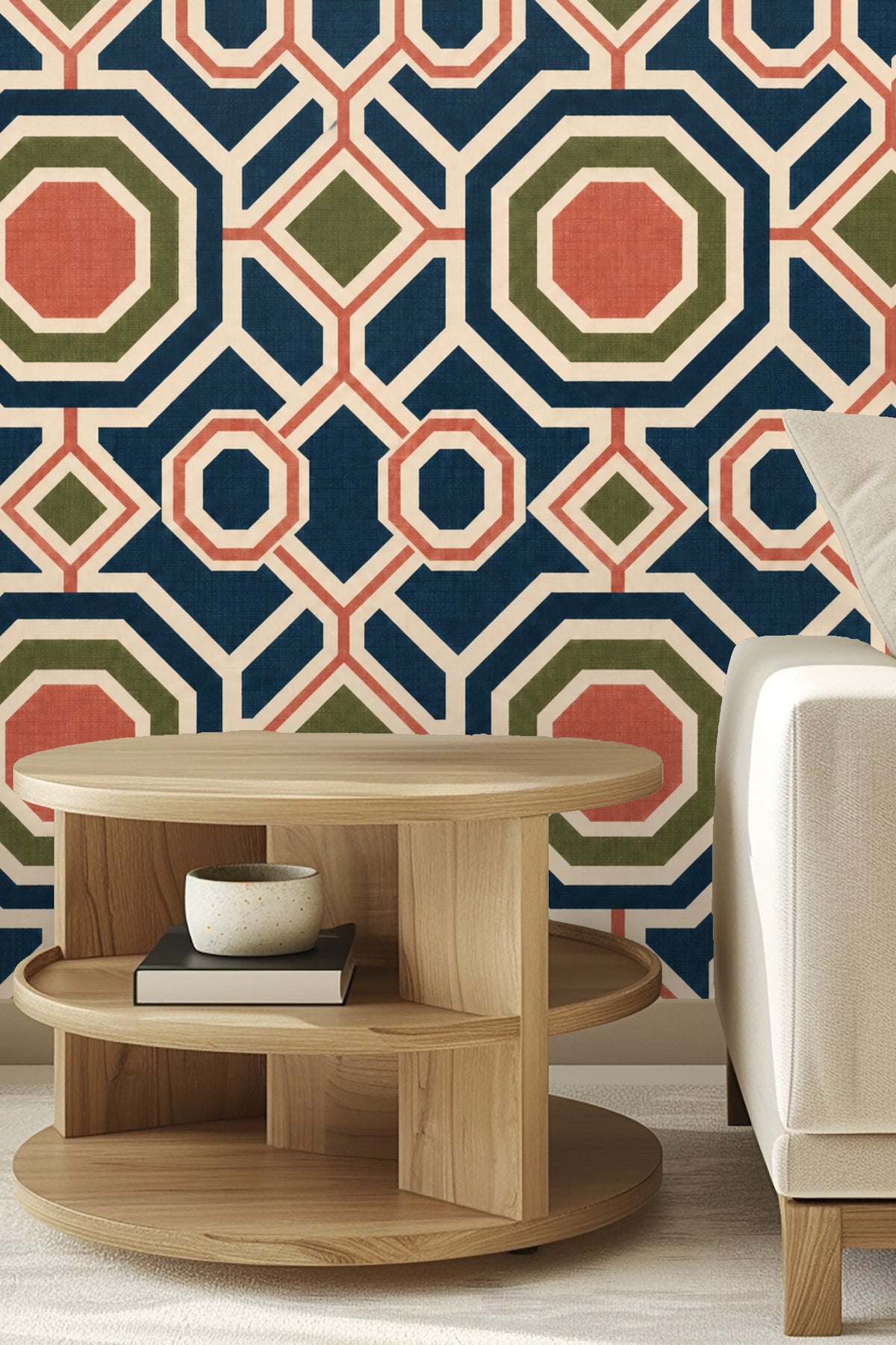 Bedroom featuring wall covered in octagonal window motif wallpaper in navy, coral, olive green, and cream behind bed with neutral linens.