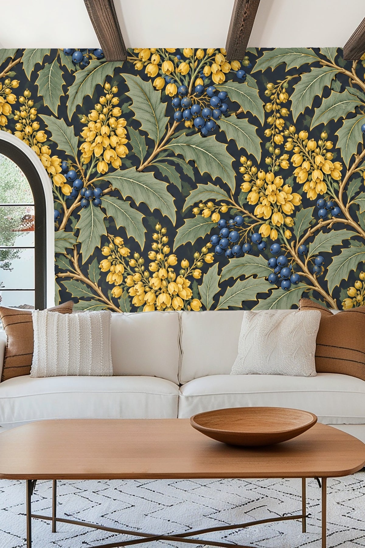 Living room with orange velvet sofa against wallpaper featuring yellow flower clusters and blue berries on green leaves