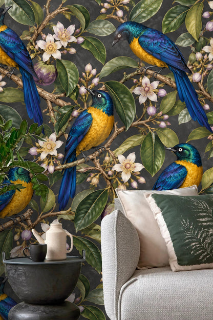 Wallpaper artwork detail showing golden starlings perched on starapple branches with blue and yellow feathers against dark background
