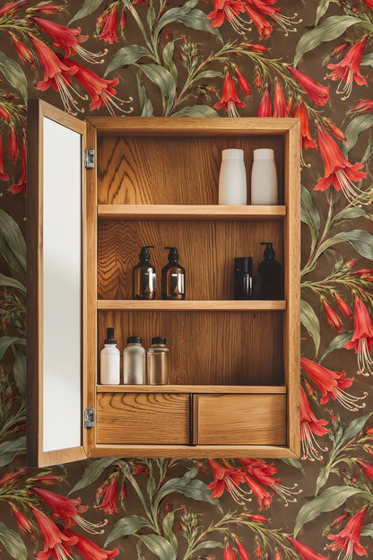 Laundry room interior with scarlet trumpet floral wallpaper on walls behind washer, dryer, wooden countertop, and shelves
