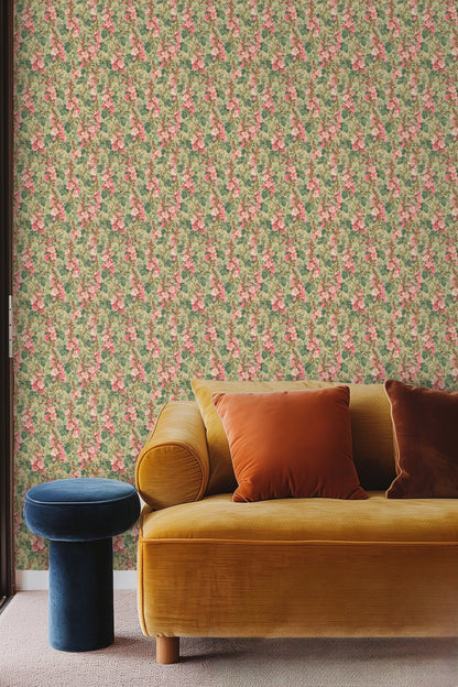 Wallpaper with pink Sidalcea floral columns installed behind a peach velvet headboard and white bedding