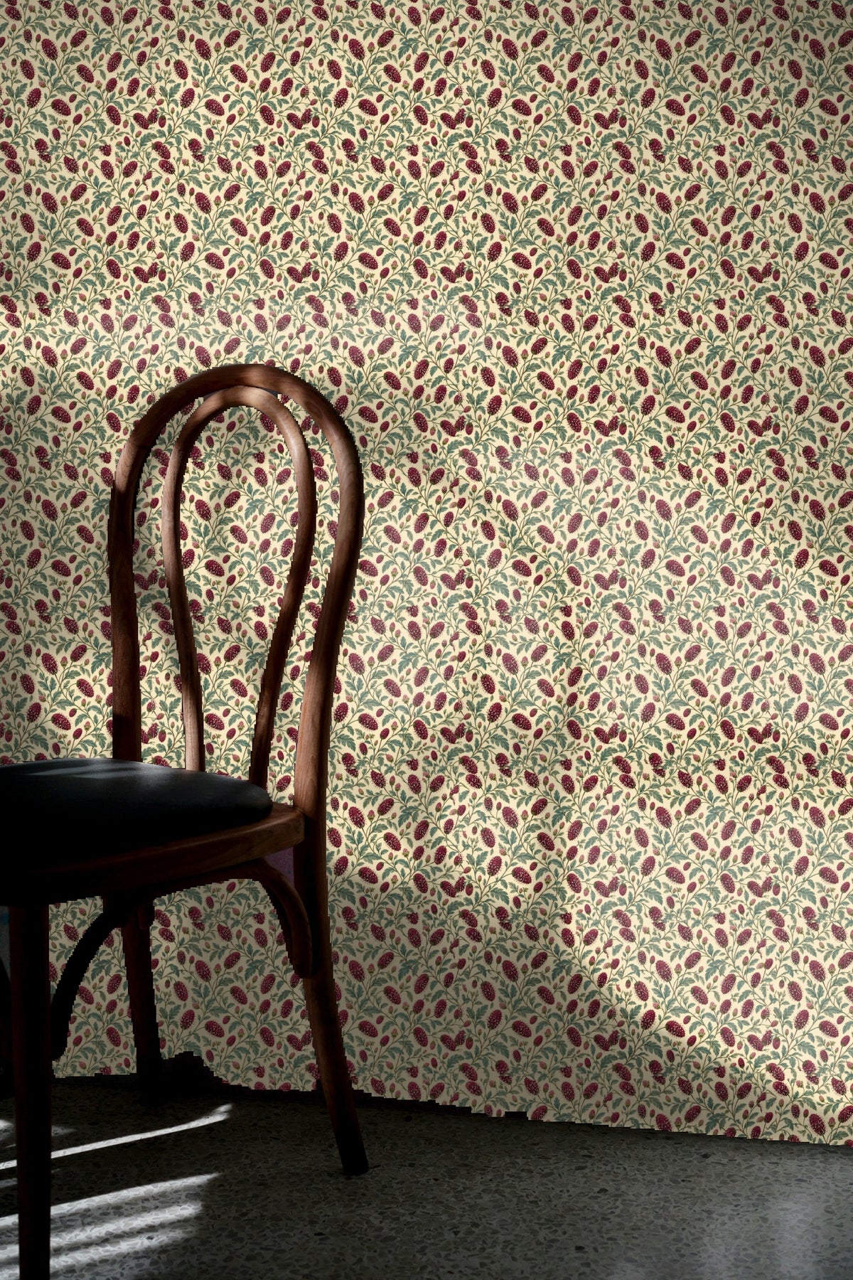 Sanguisorba garnet wallpaper in a soft cream colored room with natural light