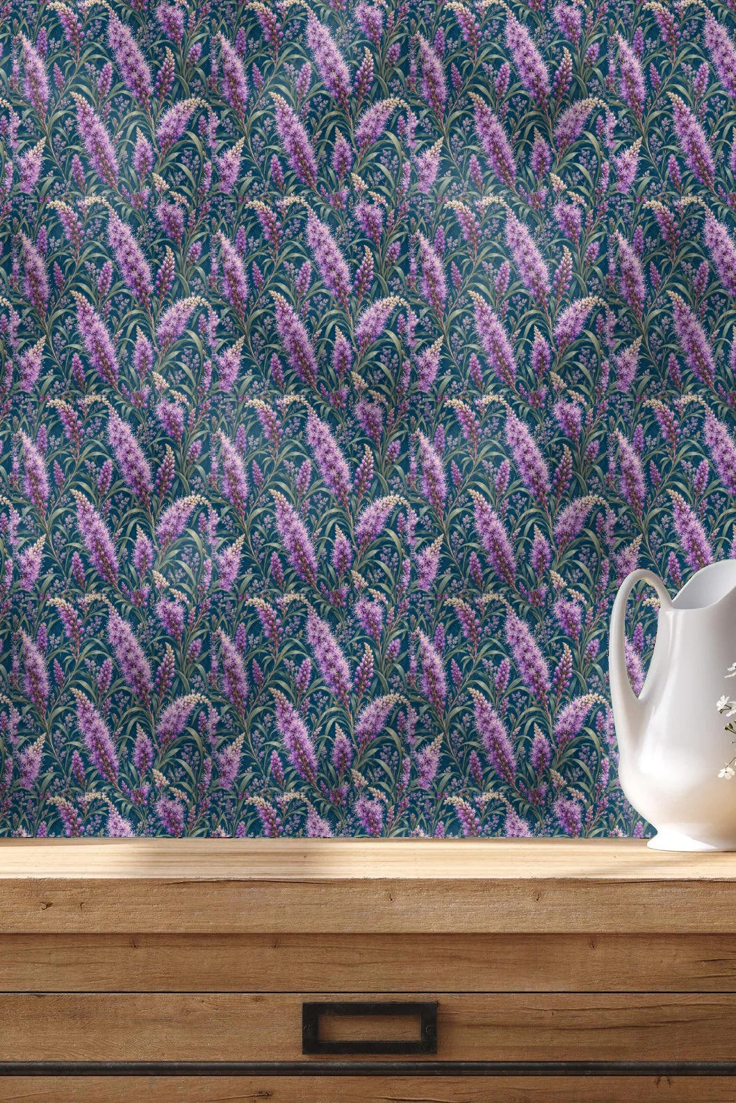 Close-up detail of wallpaper floral motif showing layered petals and stamens in violet tones.