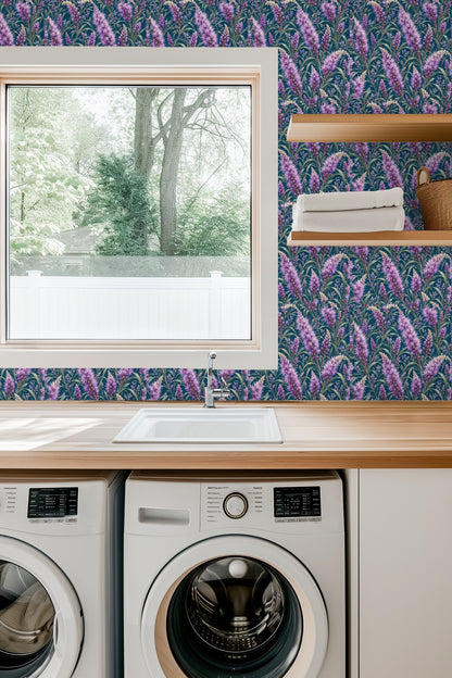 Close-up view of painterly liatris flower clusters in shades of violet and lavender on wallpaper.