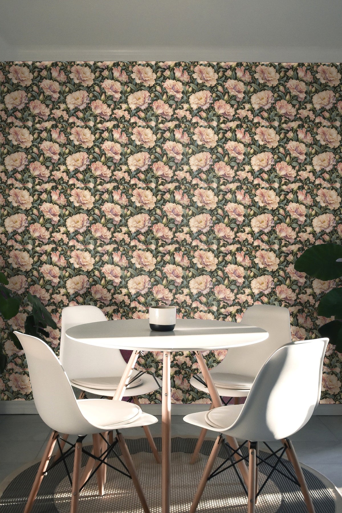 Muted background contrasting with pastel floral highlights on wallpaper