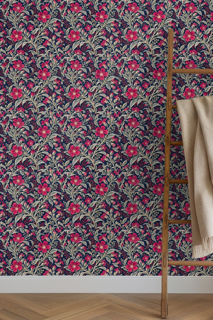 Living room featuring navy blue botanical wallpaper with crimson flowers and silver leaves, orange sofa