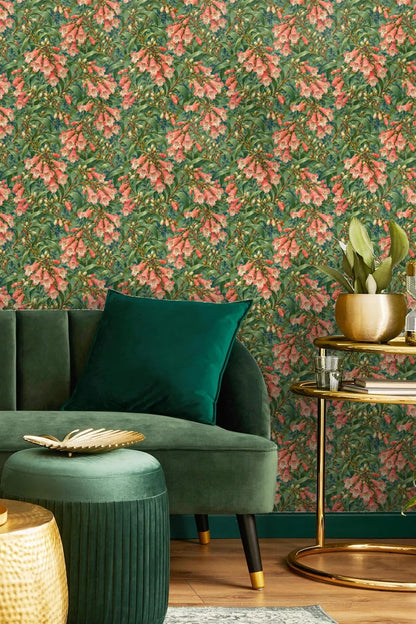 Bedroom scene with mustard yellow velvet headboard against coral penstemon trumpet wallpaper.