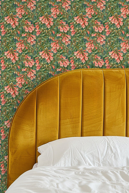 Detailed close-up of penstemon coral trumpet flowers and leafy stems on green background wallpaper.