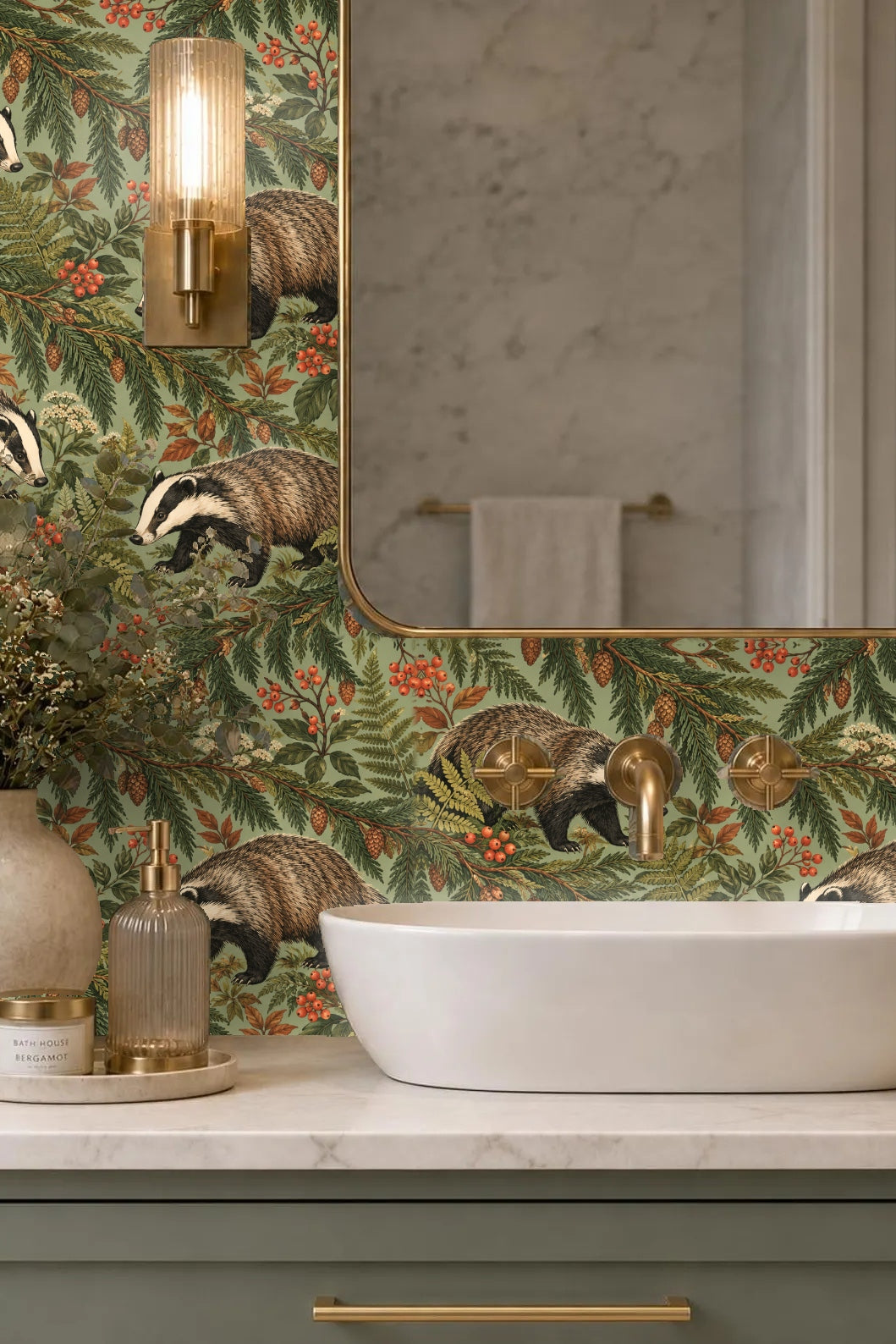 Room setting showing candle and flowers on wooden side table in front of wallpaper with badgers and cedar
