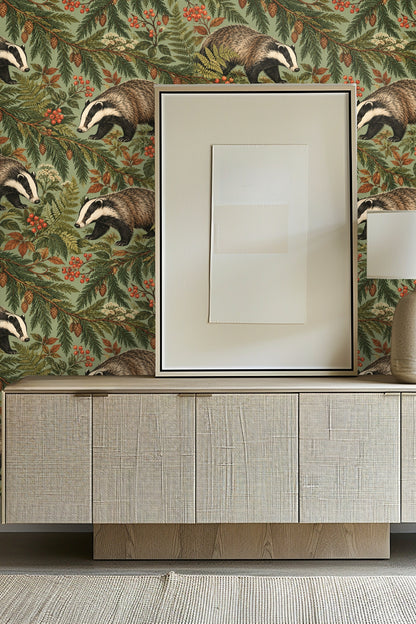 Detailed wallpaper artwork of badgers among cedar branches with red berries and ferns on a sage green background