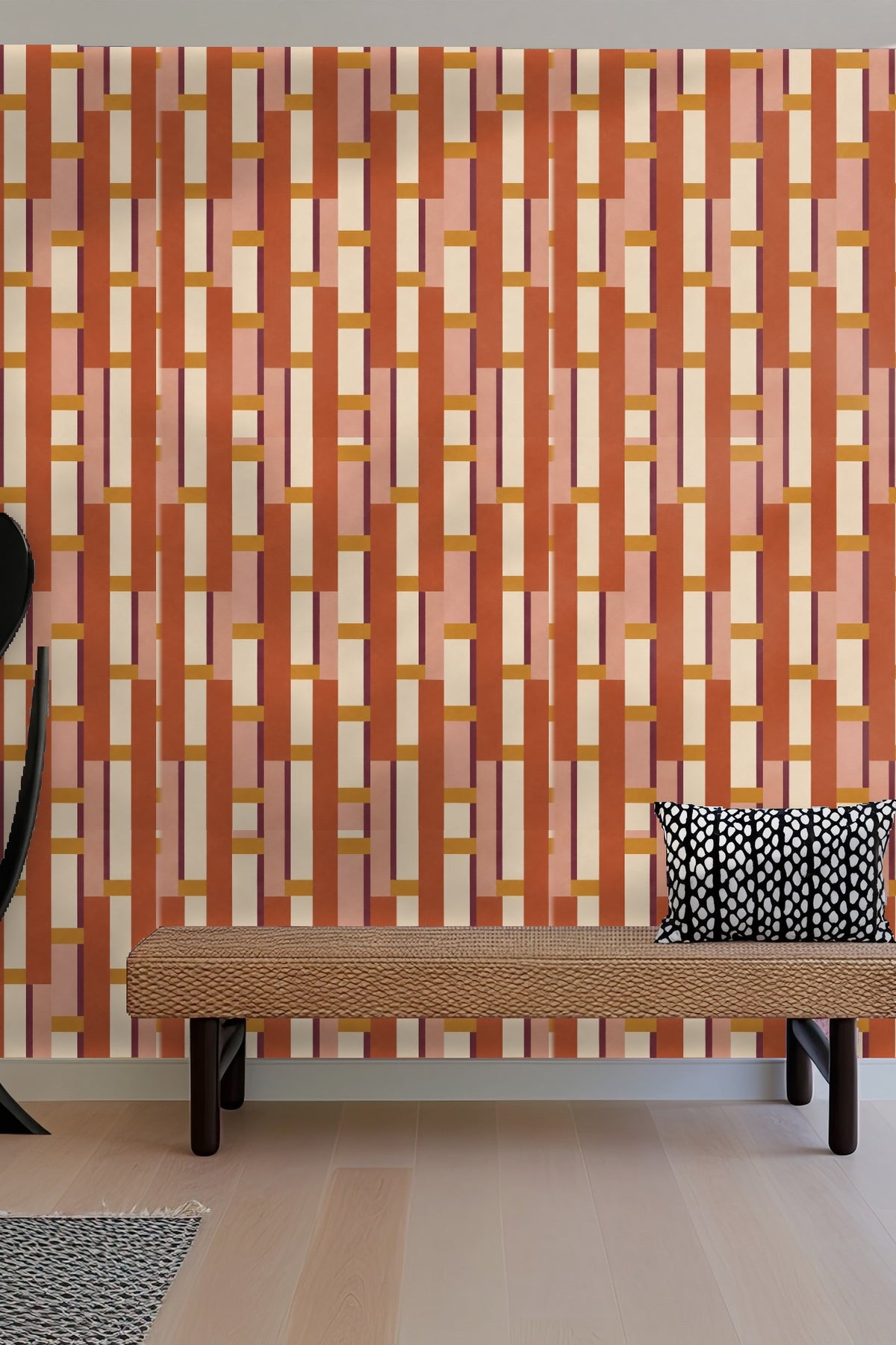 Detail close-up of geometric stacked block wallpaper with terracotta and ochre colors.