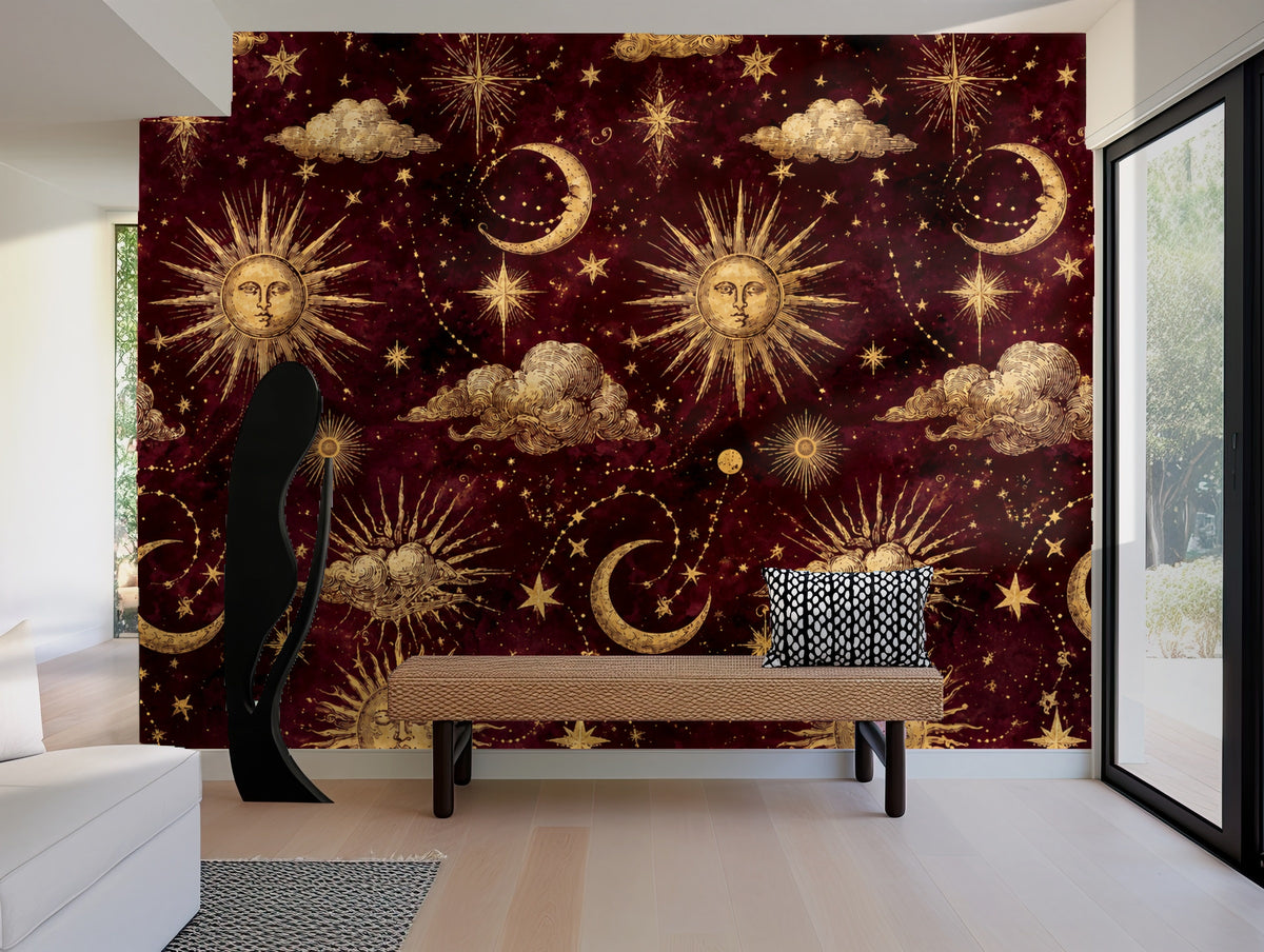 Full repeat tile of celestial wallpaper showing gilded suns, crescent moons, starbursts and clouds on a deep burgundy background