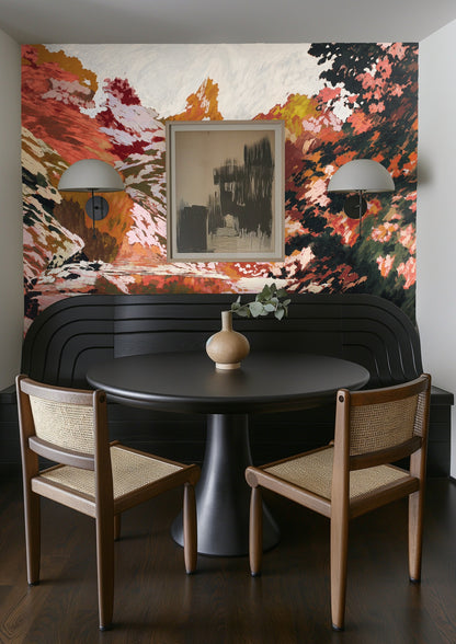 Gallery wall styling over the mural, framed prints placed directly on the painted landscape to show scale and layering with art