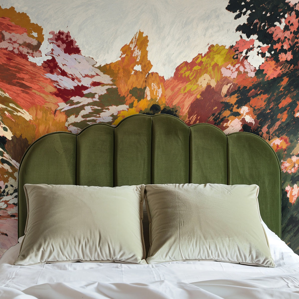 Arched niche with round mirror framing the mural, painterly foliage and reflective pool visible within a plaster alcove