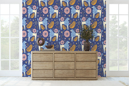 Close-up repeat pattern of Celestial Grove showing stylized llamas, starbursts, fans and hearts on an indigo background