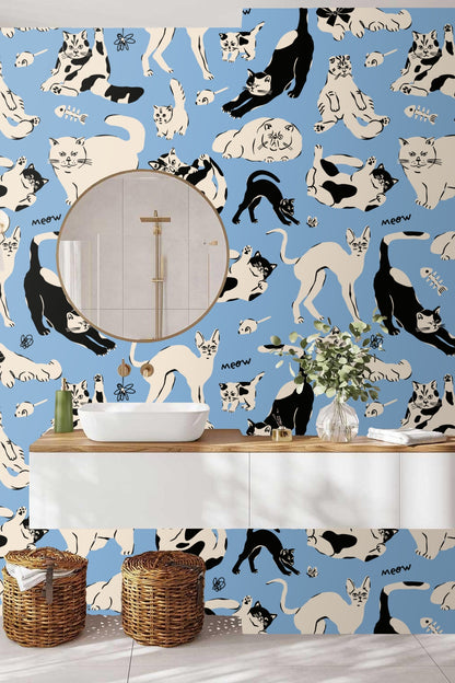 Blue wallpaper sample showing repeated cat pattern on roll edge