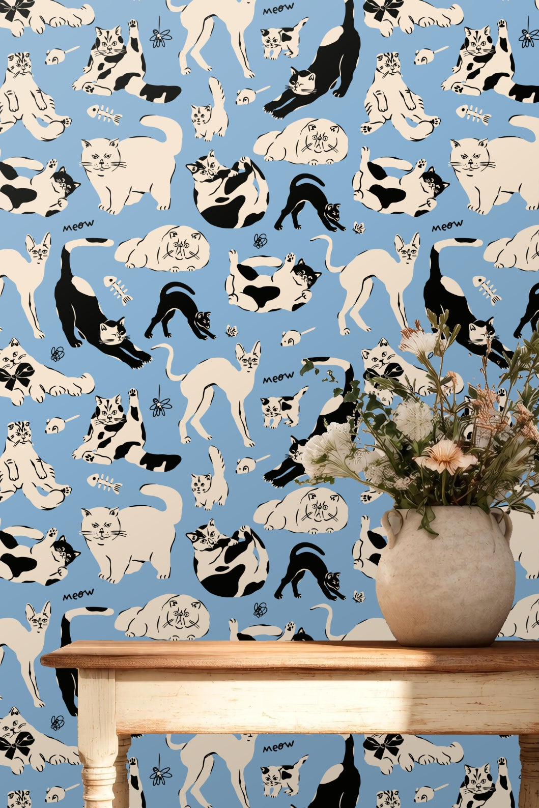 Pattern repeat detail focusing on cats lying and sitting