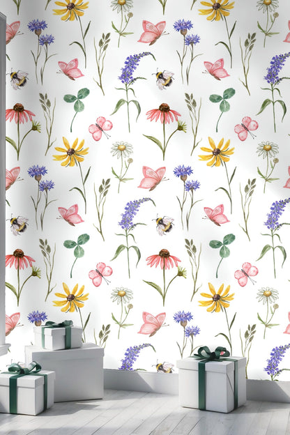 Soft pastel leaves and floral details captured in watercolor style wallpaper.