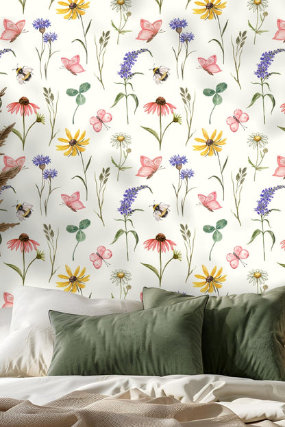 Light-filled room showing small-scale floral and insect wallpaper blending with pastel décor.