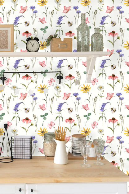 Wallpaper pattern featuring hand-painted botanical elements with a playful, natural vibe.