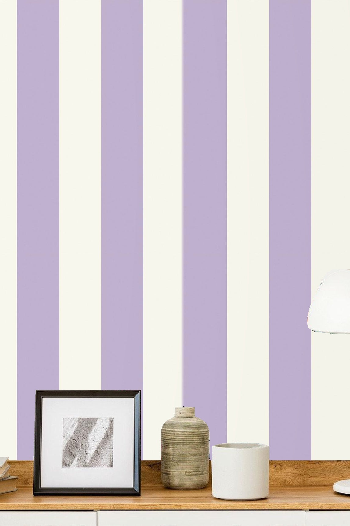 Bedroom corner with wooden furniture and lavender and ivory striped wallpaper