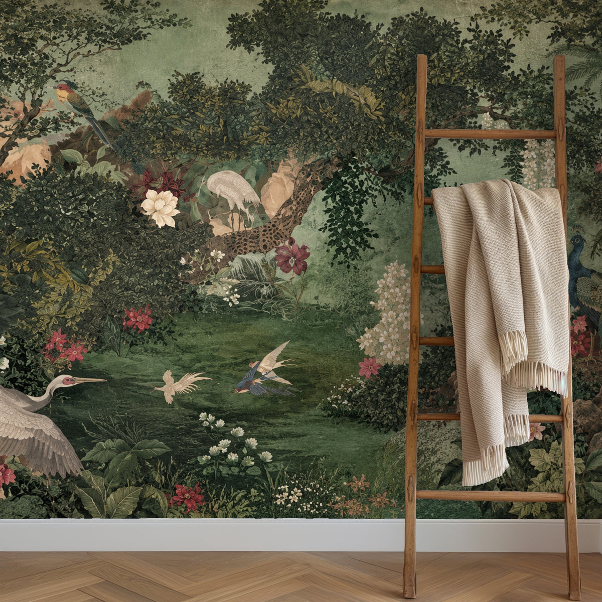 Bedroom close crop with a scalloped moss-green headboard in front of the mural, highlighting layered leaves and cream blossoms.