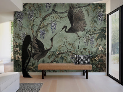 Full composition of the Viridian Crane Mural showing two dark cranes, willow branches and hanging wisteria on a textured sage-green ground.