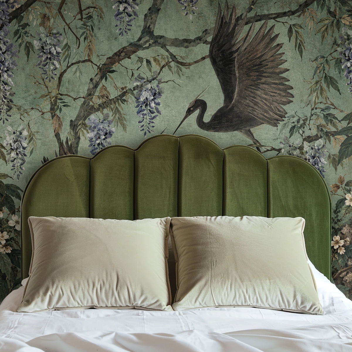 Arched niche vignette with a circular mirror, the mural cropped to reveal a crane wing and trailing wisteria.