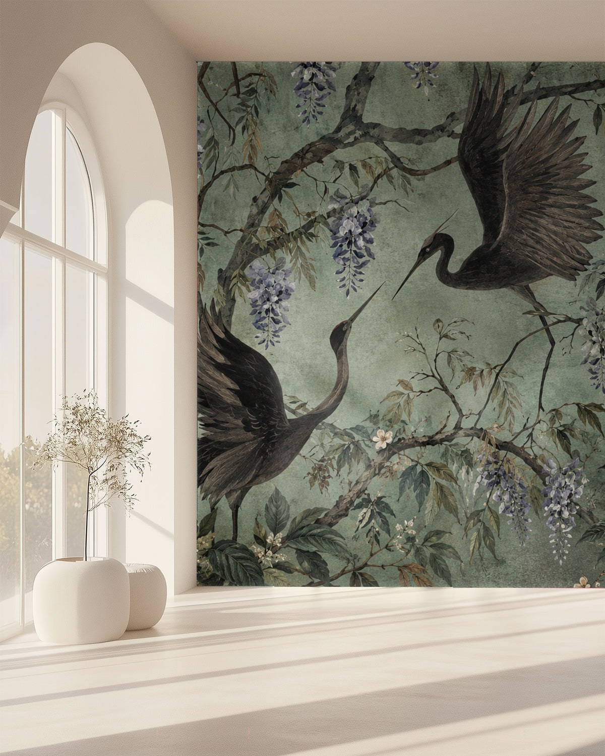 Nursery view with a white vintage crib set against the mural, cranes and cream blossoms forming a storybook backdrop.