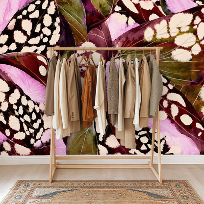 Entry console styled in front of the Begonia Nocturne mural, showcasing scale and color contrast with neutral decor