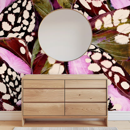 Tight crop of the pattern showing painterly watercolor edges, black negative shapes and cream flecked spots