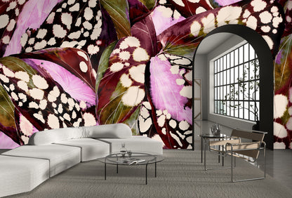 Close-up of Begonia Nocturne wallpaper showing layered begonia leaves with cream spotted markings and magenta washes