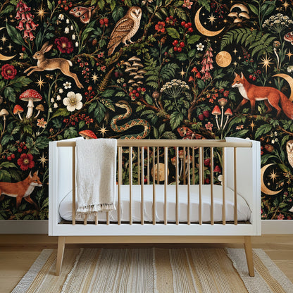 Full repeat of Lunar Thicket wallpaper showing foxes, owl, hare, snake, mushrooms, ferns and gold moons on a black background.