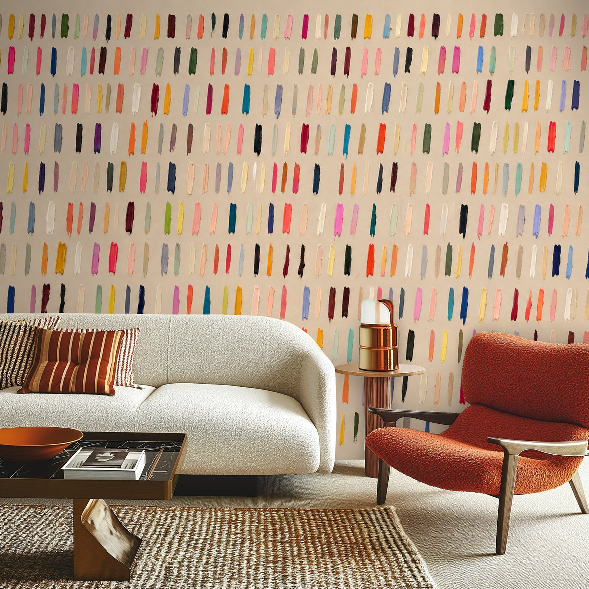 Living room vignette with deep blue velvet sofa in front of the multicolor brushstroke wall