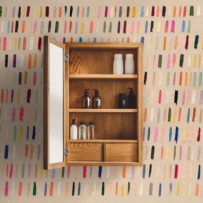 Close crop showing the painterly texture of individual vertical brush marks in varied hues against beige