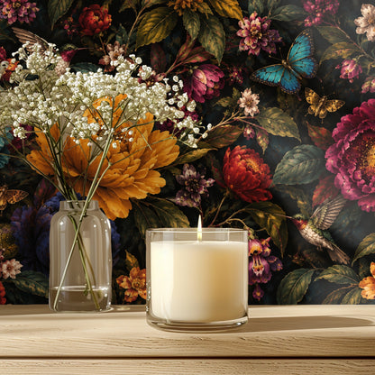 Close-up of the Midnight Florilegium wallpaper showing a large golden peony, teal petals and detailed leaves on a dark background